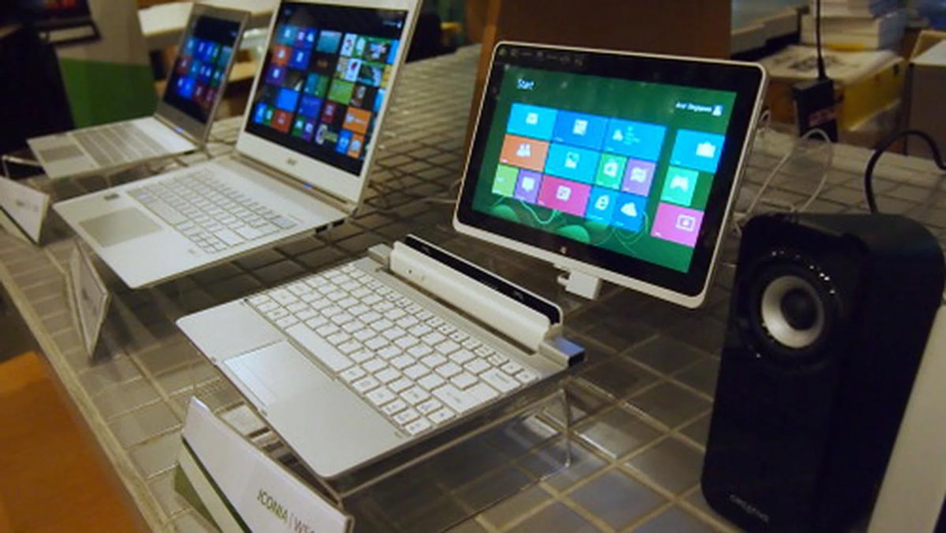 No it's not an Ultrabook that has been beheaded. It's a hybrid tablet that comes bundled with its own keyboard dock, 