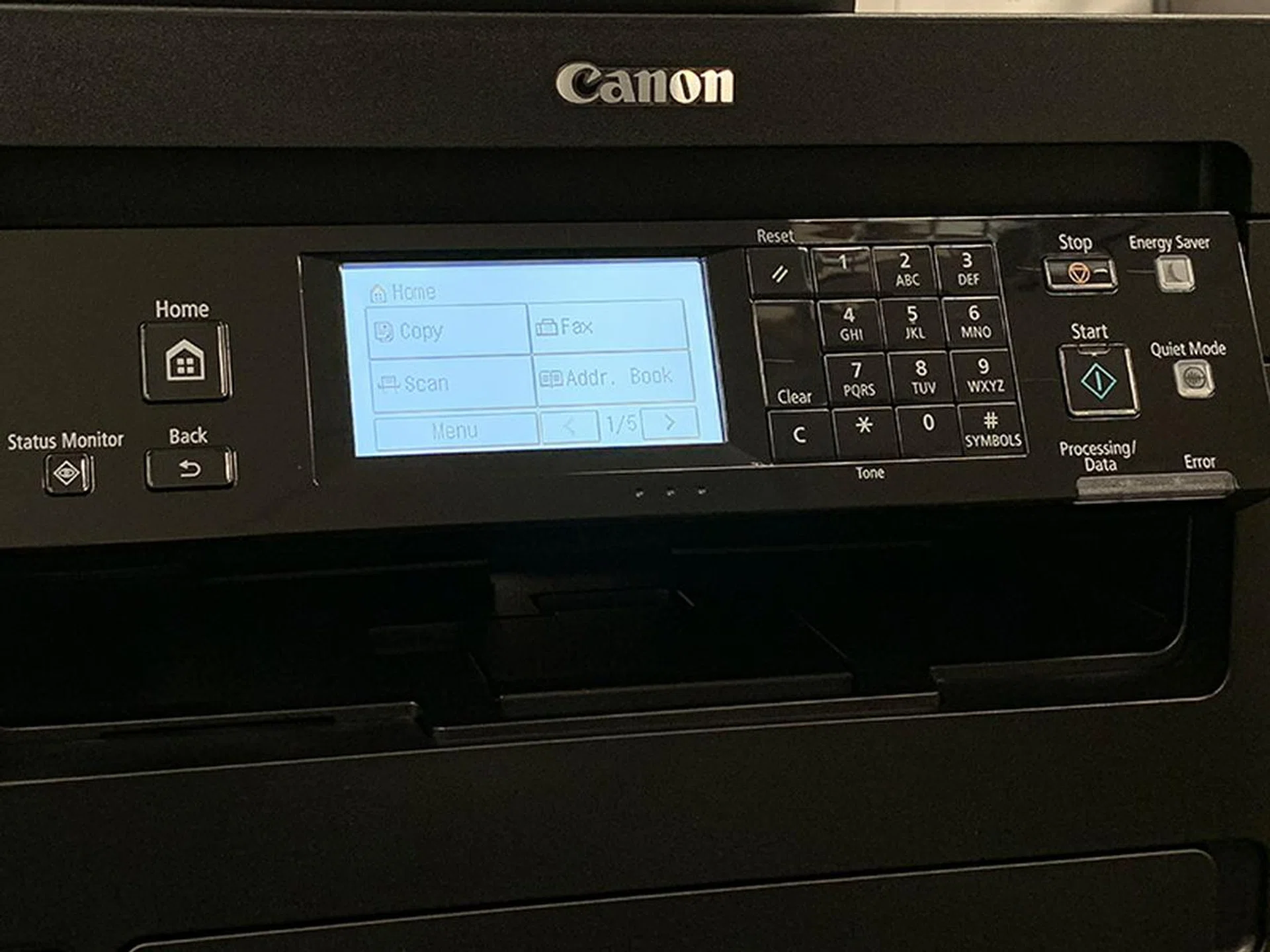 The printer has a 6-line monochrome touch LCD, but it also has physical buttons for key functions (e.g. numpad).