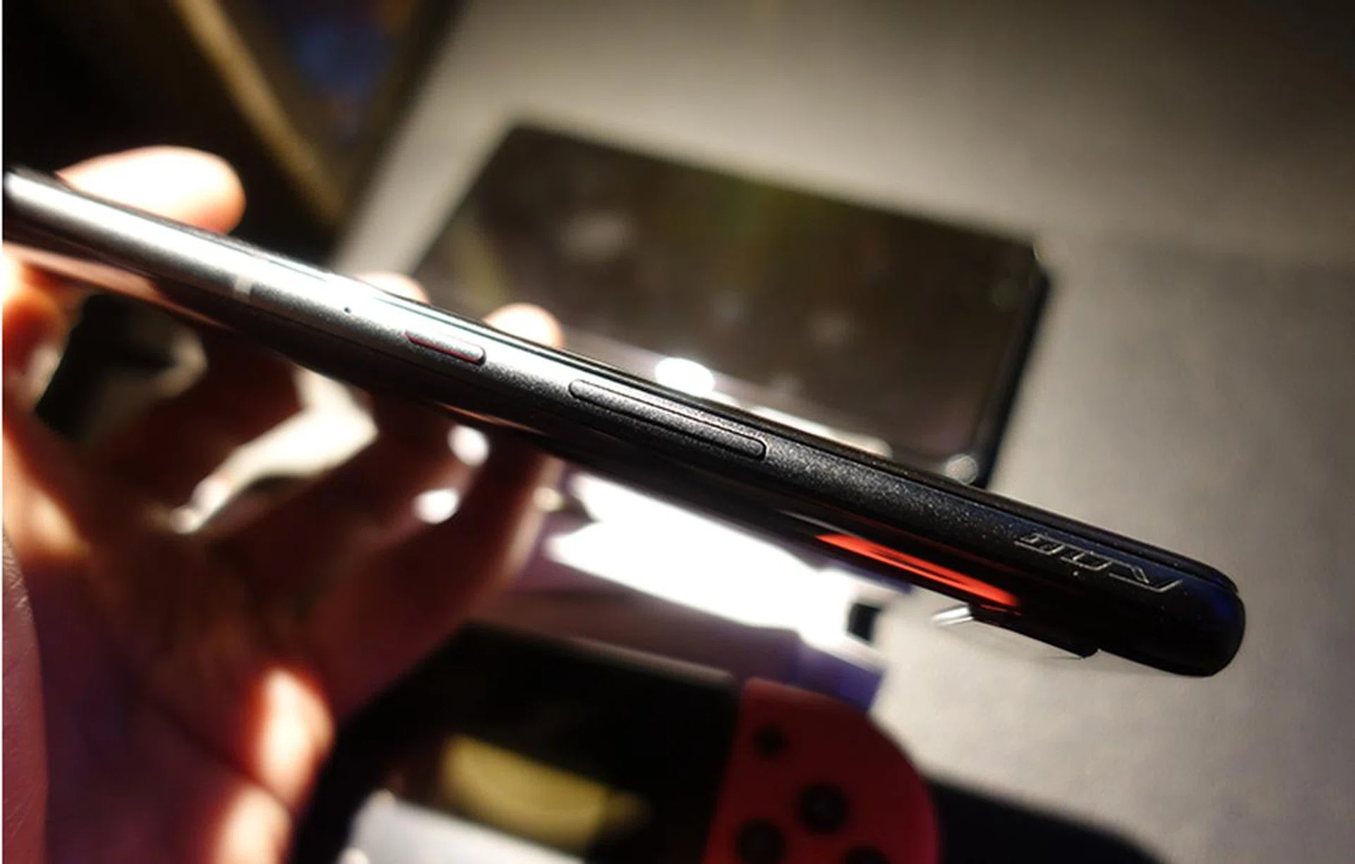 One of the new AirTrigger 5 button as seen on the far right.