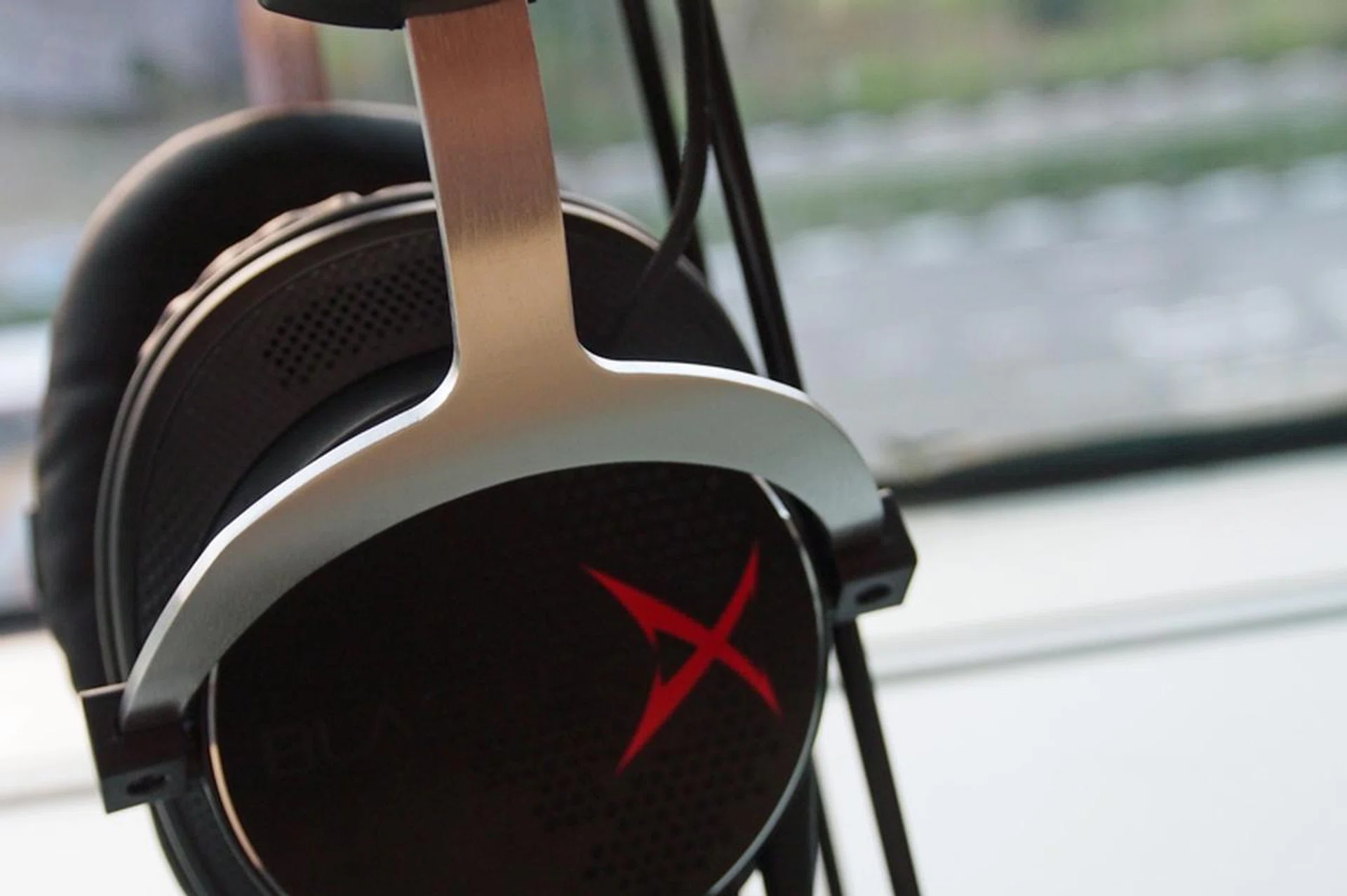 The Creative Sound BlasterX logo with its metallic frame.