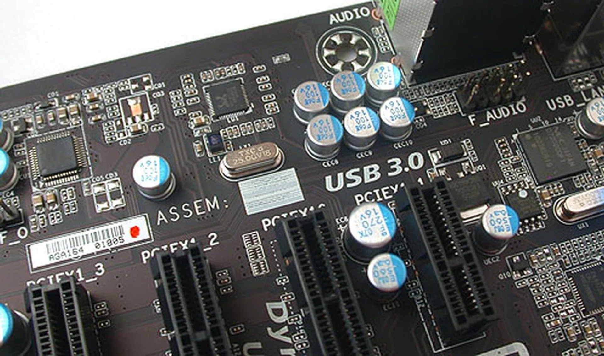 There aren't that many onboard controllers as more premium boards. Here you can notice there's the usual audio CODEC chip, Ethernet and USB 3.0 controllers.