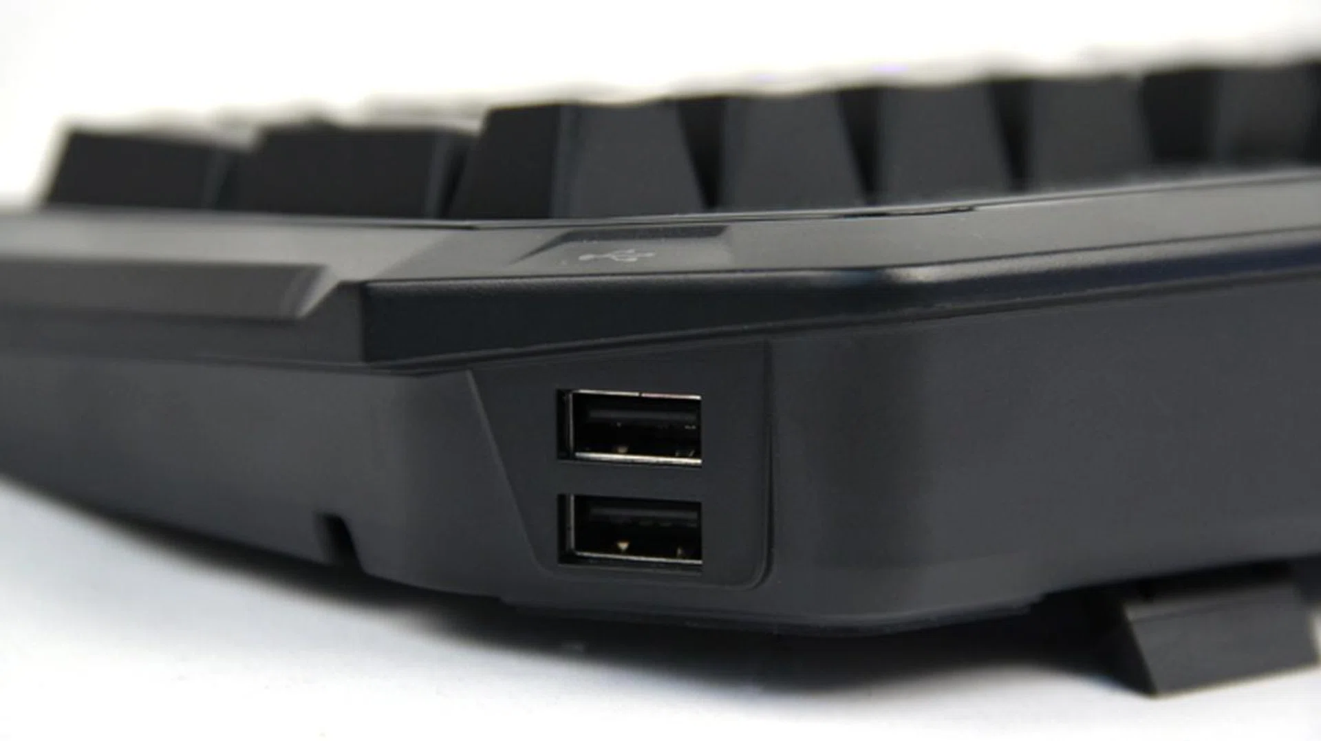 On the back right corner, you'll find two USB 2.0 ports, useful for connecting your mouse.