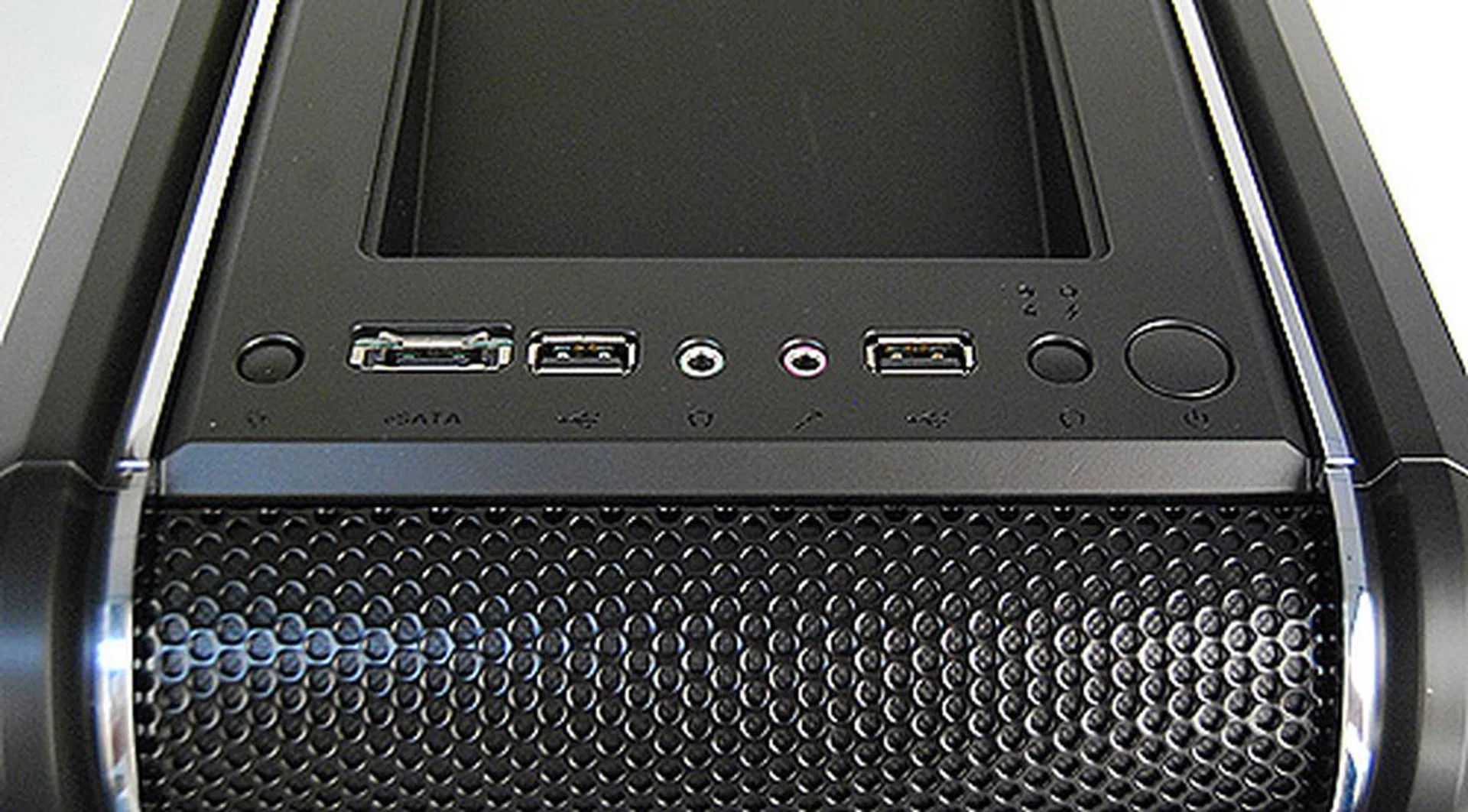 This is the front IO panel. From left to right: a button to control the LED fan, eSATA port, two USB 2.0 ports flanking the headphones and microphone jacks, reset and power buttons.