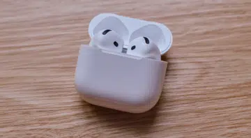 The Apple AirPods 5 with wireless charging case.