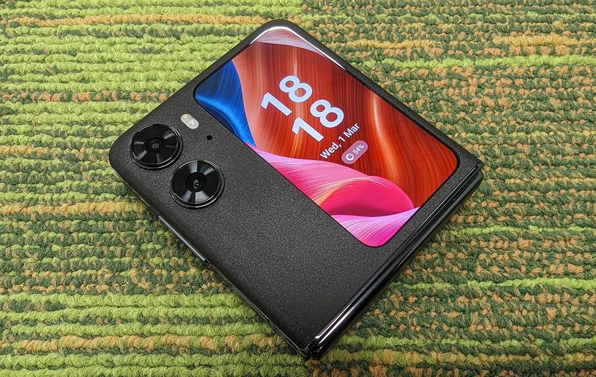 The outer display looks like a small phone unto itself. Phoneception…