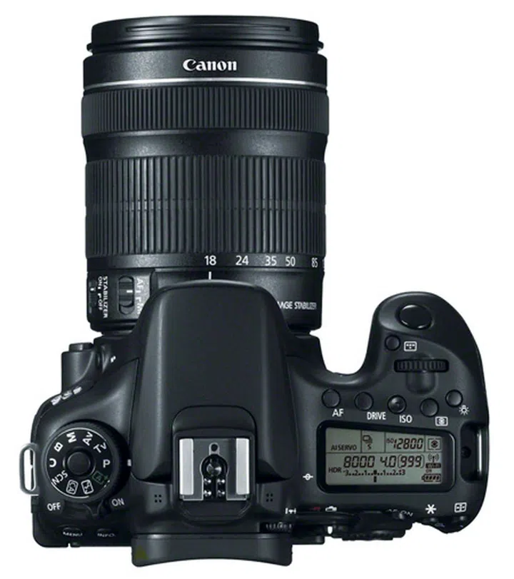 The AF point selection button has been shifted to the top of the camera, just above the control dial.