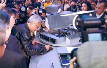 Jensen Huang, founder and CEO of NVIDIA , at the ASUS booth at Computex 2024 for the launch of the new ASUS ESC AI Pod. Image source: ASUS. 