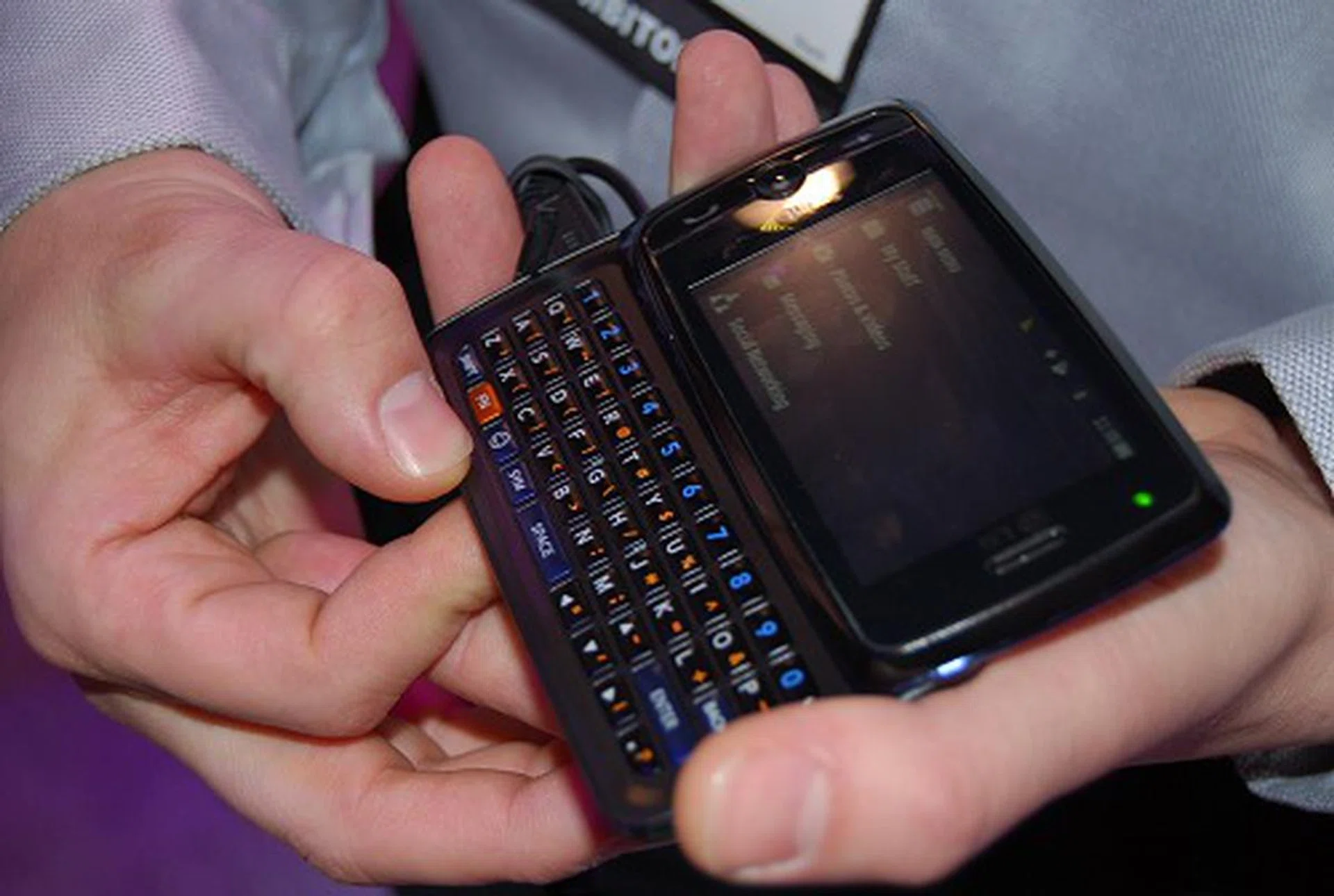 Here's the LG Rumor Touch. Has a new user interface, touchscreen interface, full QWERTY keyboard, a 2MP camera and has instant messaging and email clients. Targeted at teens, this phone is unfortunately only compatible with the CDMA network.