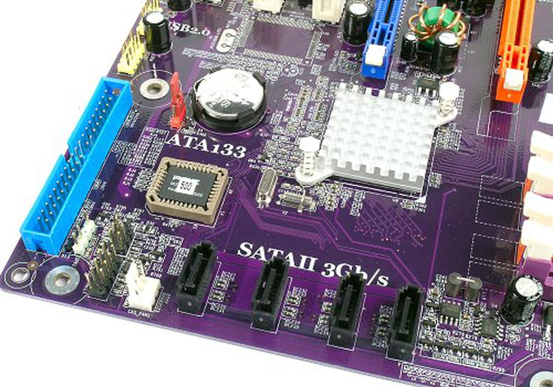 Four SATA 3.0Gbps ports sparsely arranged at the bottom, along with the primary IDE connector.