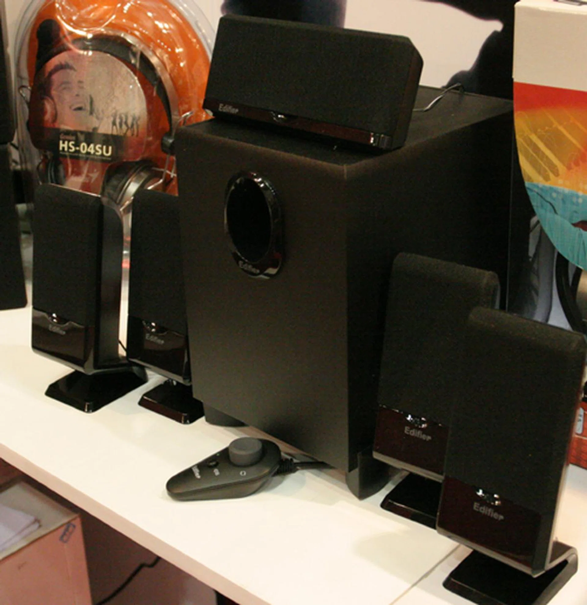  For a 5.1 channel cinematic experience, the Edifier M1550, priced at $79 is sure to deliver as expected, with a total power output up to RMS 3W x 4 + 4W + 10W and a MDF wood enclosure.  