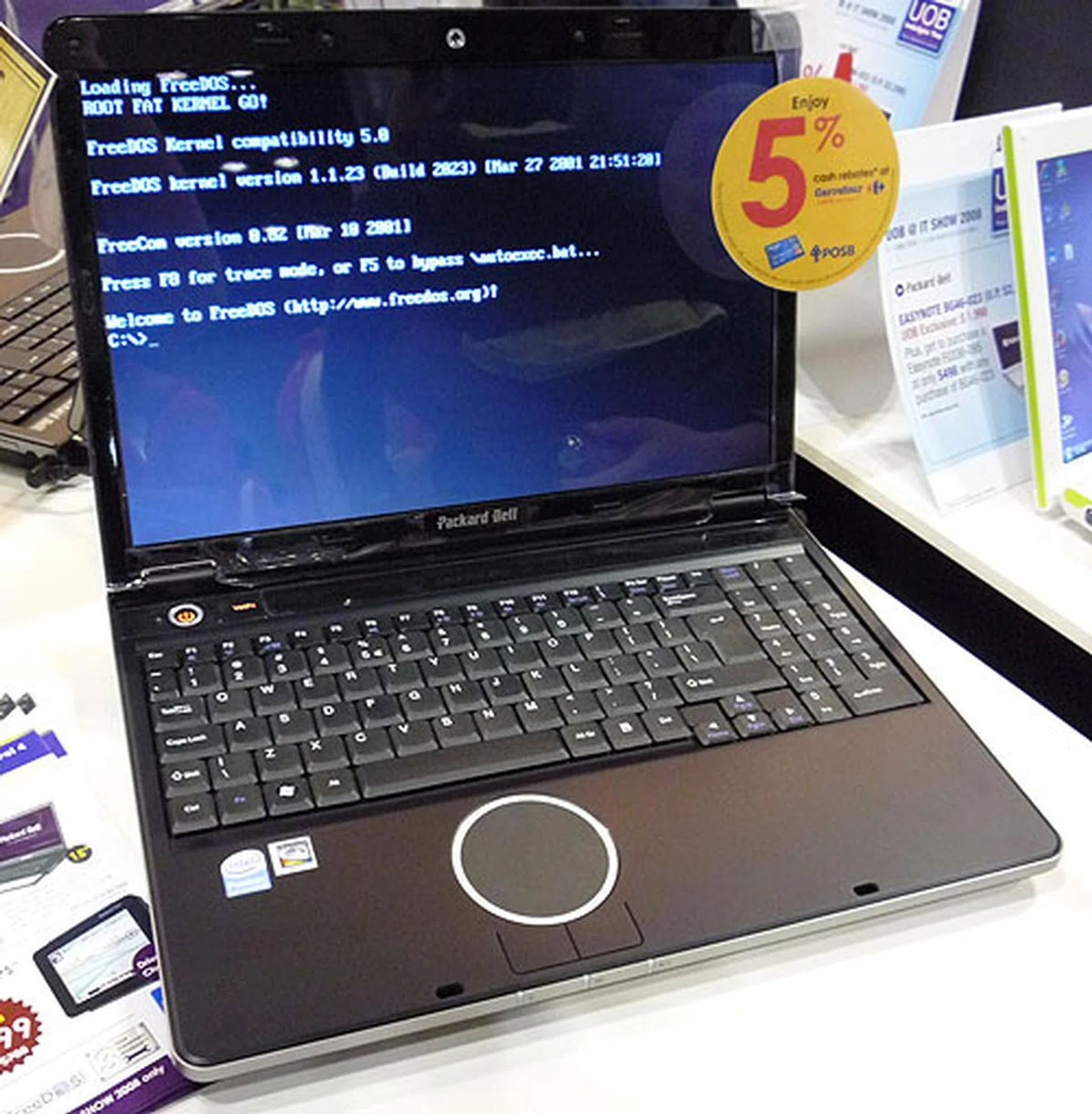  For those on a budget or intending to install their choice of OS (Linux anyone?), Packard Bell offers FreeDos as the standard install on some of their lower end models. So consumers can replace this with their preferred OS and enjoy the savings from getting a system without a bundled OS and applications.  