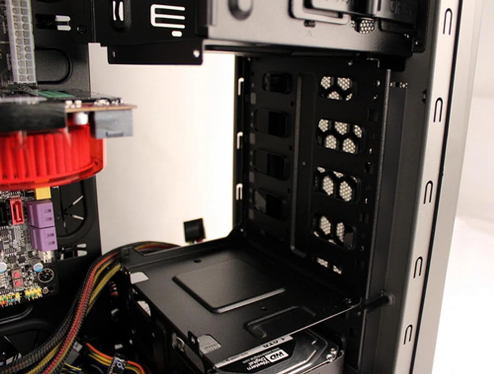 Any graphics card that is longer than 10.5 inches or has a large customized cooler will require middle drive cage's panel to be removed in order to fit into the Scout 2.