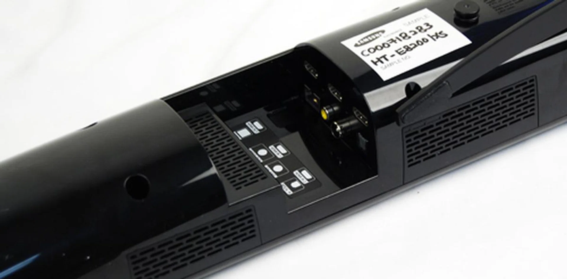 Side facing ports can be found at the back of the horizontal speakers - not really the most convenient connection method for quick ad-hoc connectivity if required.