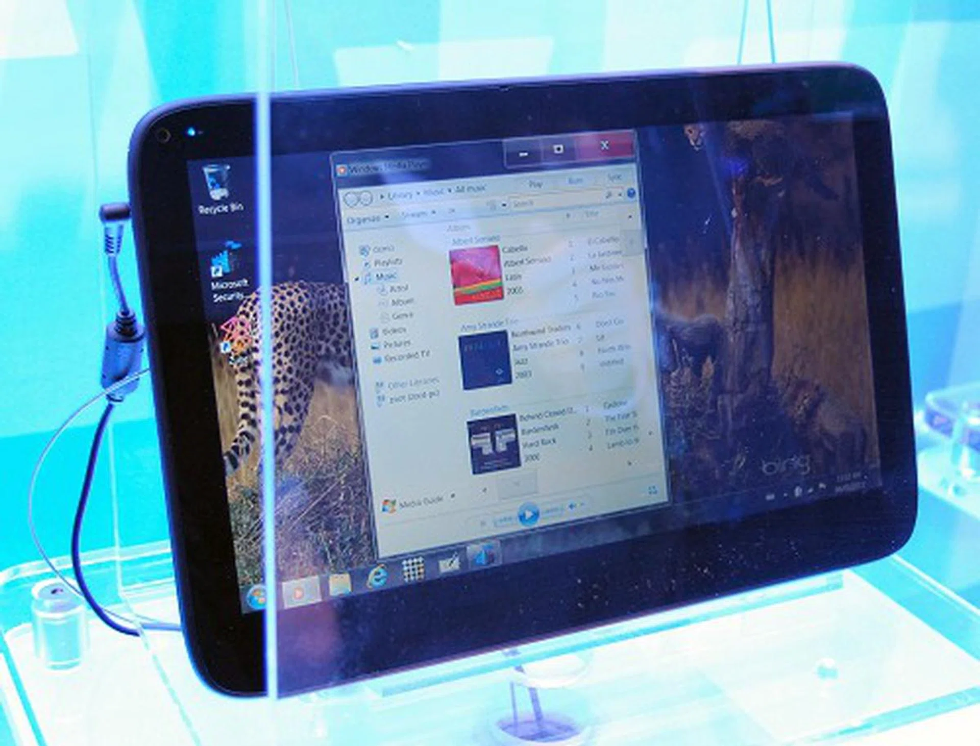 The Exo PC is a billed as a slate device running Windows 7 OS, Specs include a 11.6-inch screen, 1366 x 768 pixels resolution, Intel Atom N450, 2GB RAM, Broadcom Crystal HD chip, SSD storage and a built-in card reader and webcam. Weight is listed at 950 grams.