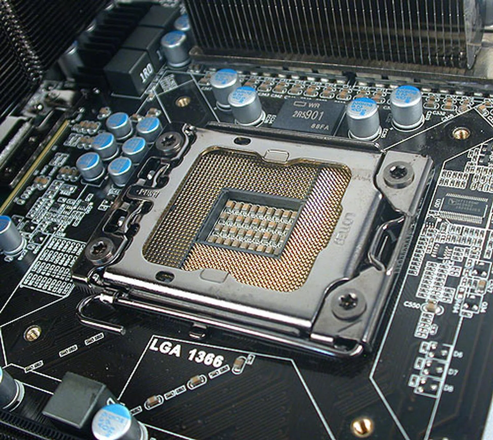 Solid capacitors are used throughout the board, with a 10-phase digital PWM power delivery system for the CPU. While we had issues installing the Intel stock cooler, other coolers may have little trouble with the confines of the CPU socket here.