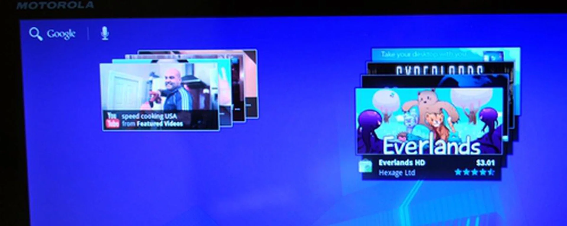  The YouTube and Android Market show items as a stack of cards. 
