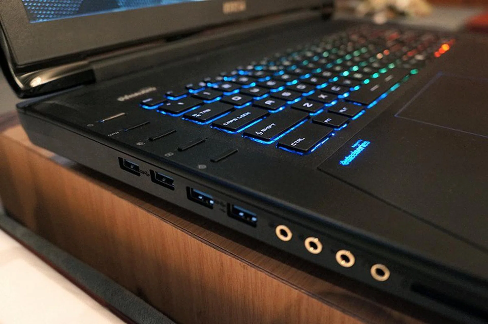 Yup, a sleeker profile than their older GT series. Also noticeable in this photo are the Quick Launch keys that are located near the edge of the notebook. These allow you to control which GPU is used (Intel/NVIDIA), bringing up the SteelSeries Engine control, Gamecaster functions and Cooler Boost 3 to rapidly change cooling options of the notebook.