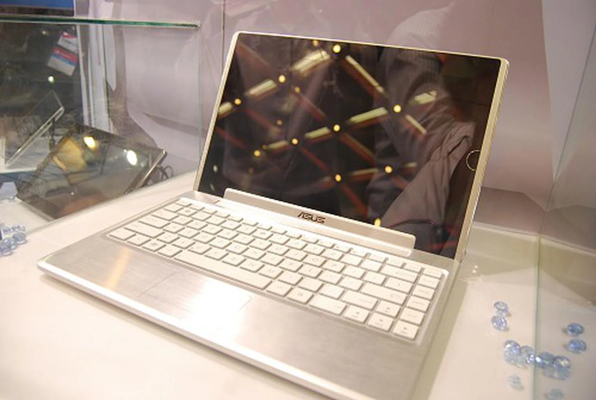 Lastly, we have here is the ASUS Eee Pad EP121. Specs include a 12-inch screen, next generation Intel Atom processor, Windows 7 Home Premium, SSD storage, stereo speakers, 1.3M webcam and HDMI output.