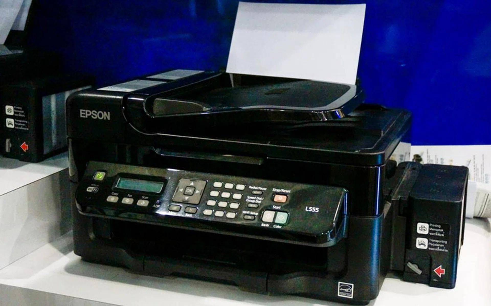 The Epson L555 is another Wi-Fi enabled AIO Ink Tank Printer. It also prints at 33/15ppm (Mono/Color), supports Epson iPrint, and uses Epson’s Low Cost High Yield Ink Bottles for cost effective printing. This is going for a show special of $359 (usual price $399), and comes with $20 of NTUC vouchers and a free trolley. There is also a 1 year or 30,0000 pages warranty included.