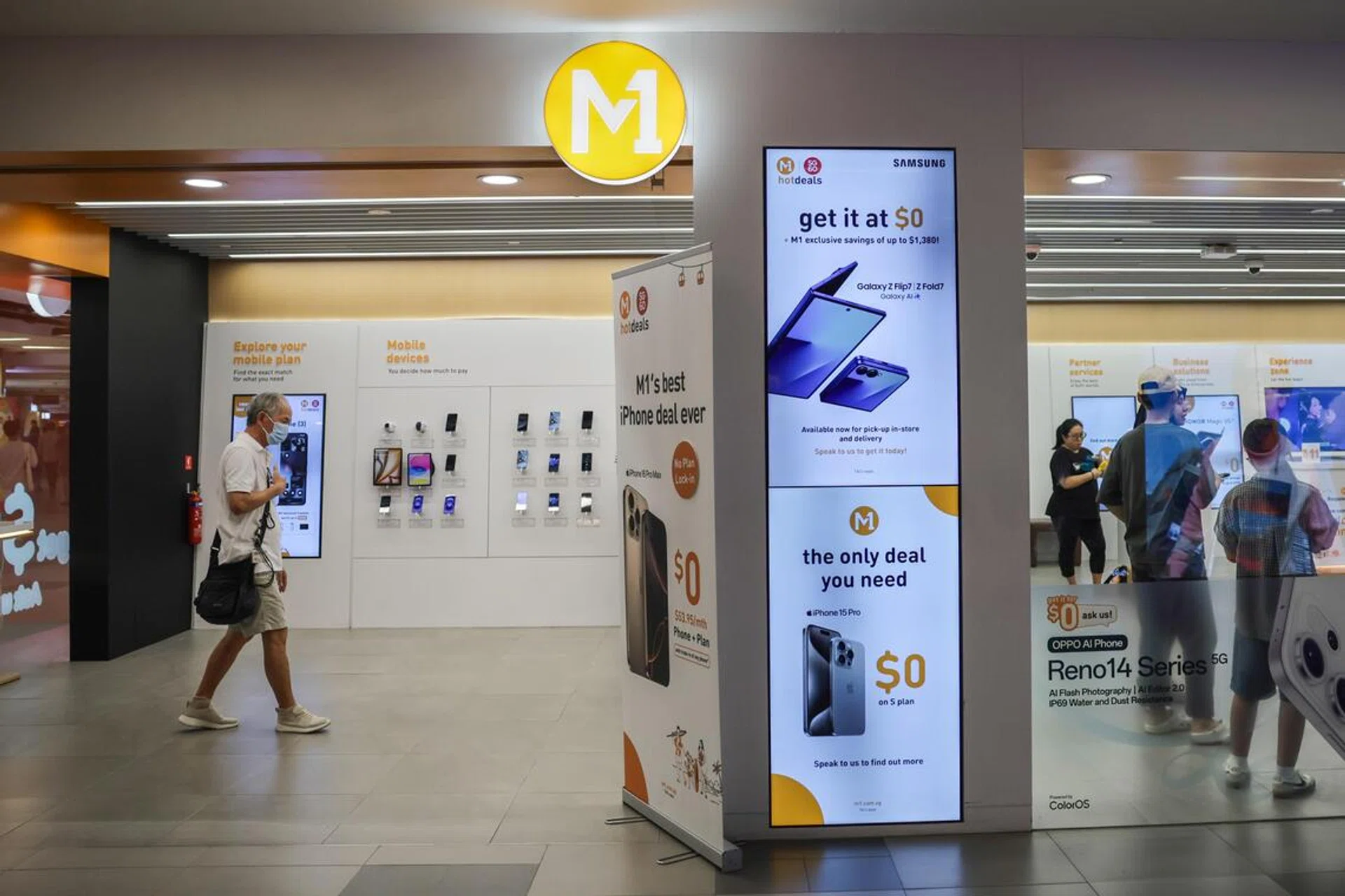 Pixgeneric / Generic photo of facade of M1 store at NEX on Aug 11, 2025. Can use for stories on 5G, 4G, telecom, network, internet, mobile phone, broadband, authorised dealers