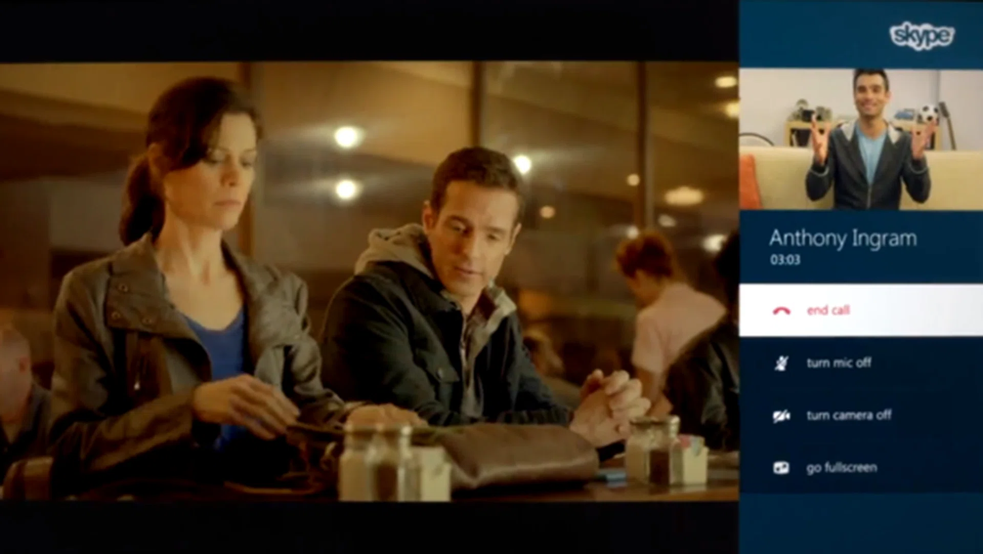 Not unlike Windows 8, Snap Mode lets you run two apps such simultaneously. Here, the user is watching TV while taking a Skype call.