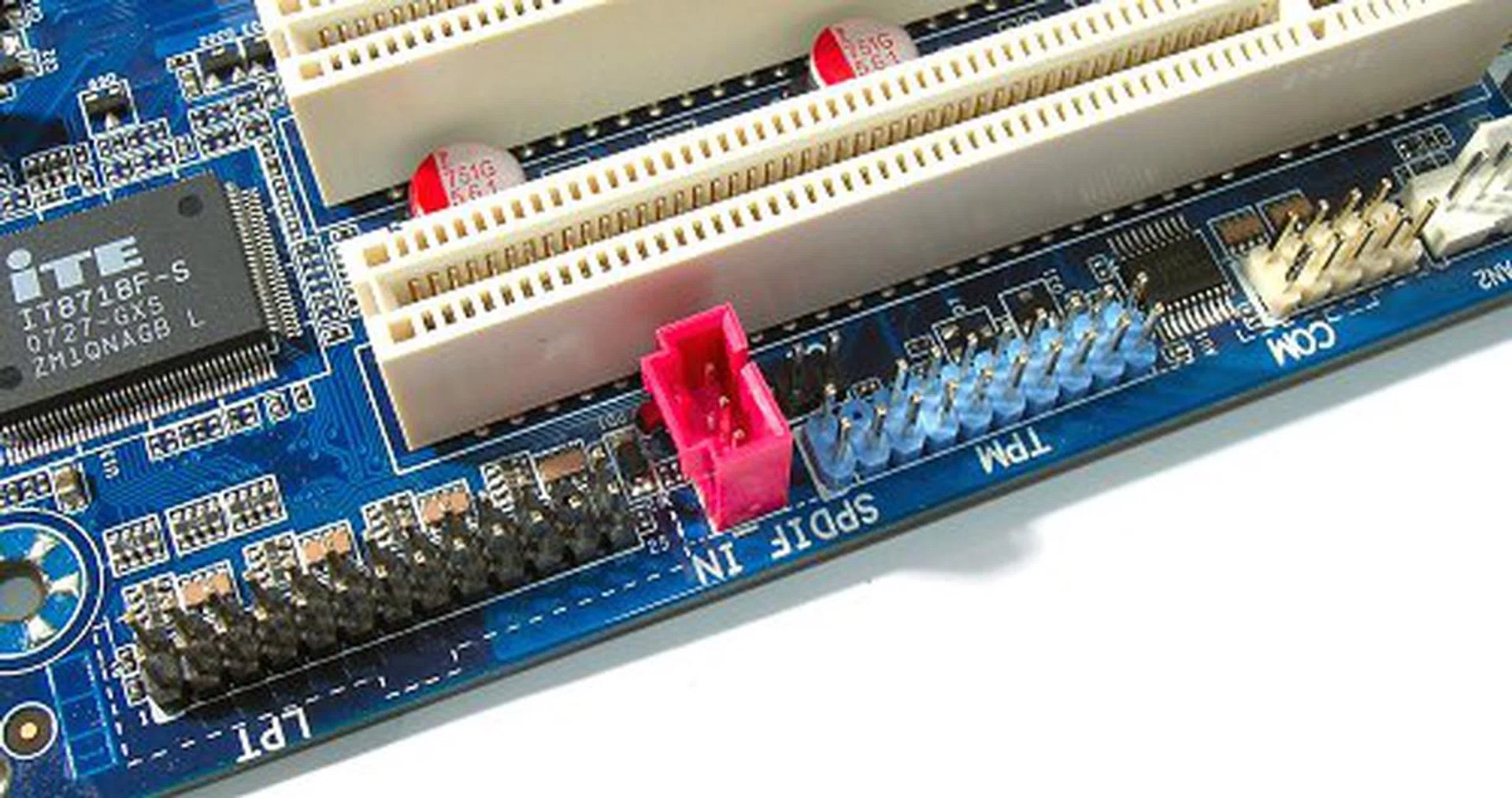 More connectors lining the bottom. Notice that the board supports optional TPM modules as well.