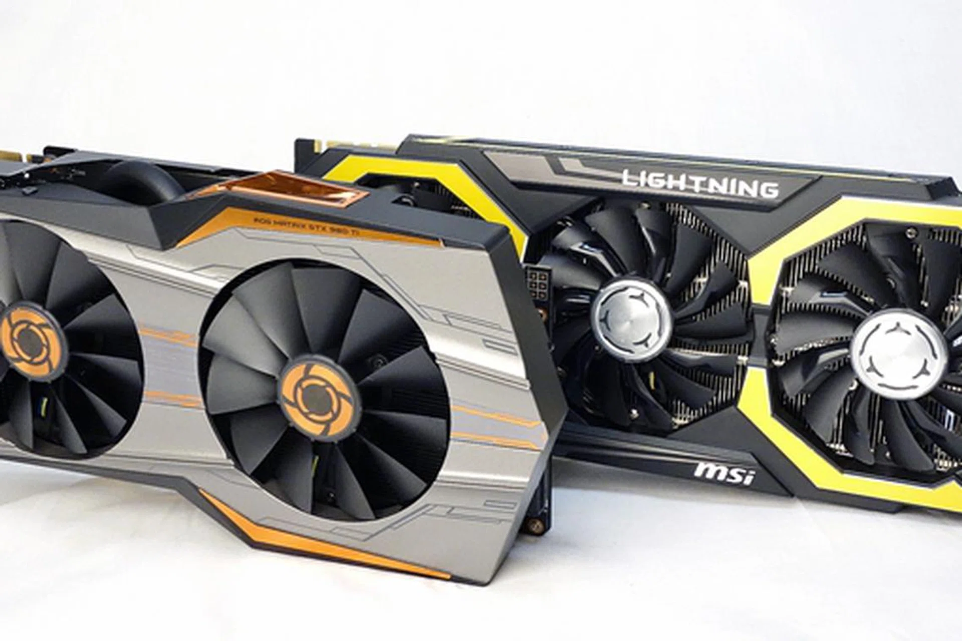 (left) The ASUS ROG Matrix GTX 980 Ti Platinum Edition card; (right) the MSI GeForce GTX 980 Ti Lightning card. Take a good look at them as these high-end cards could be the last of their prestigious breed.