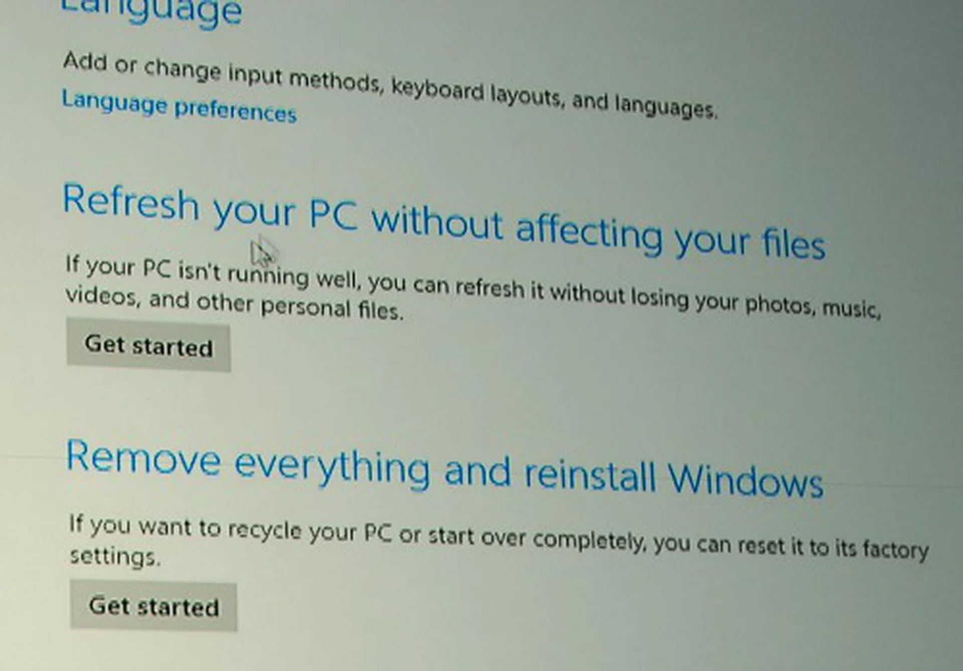 And here are the discussed options - Refreshing your PC and below that, Remove everything refers to resetting the system.
