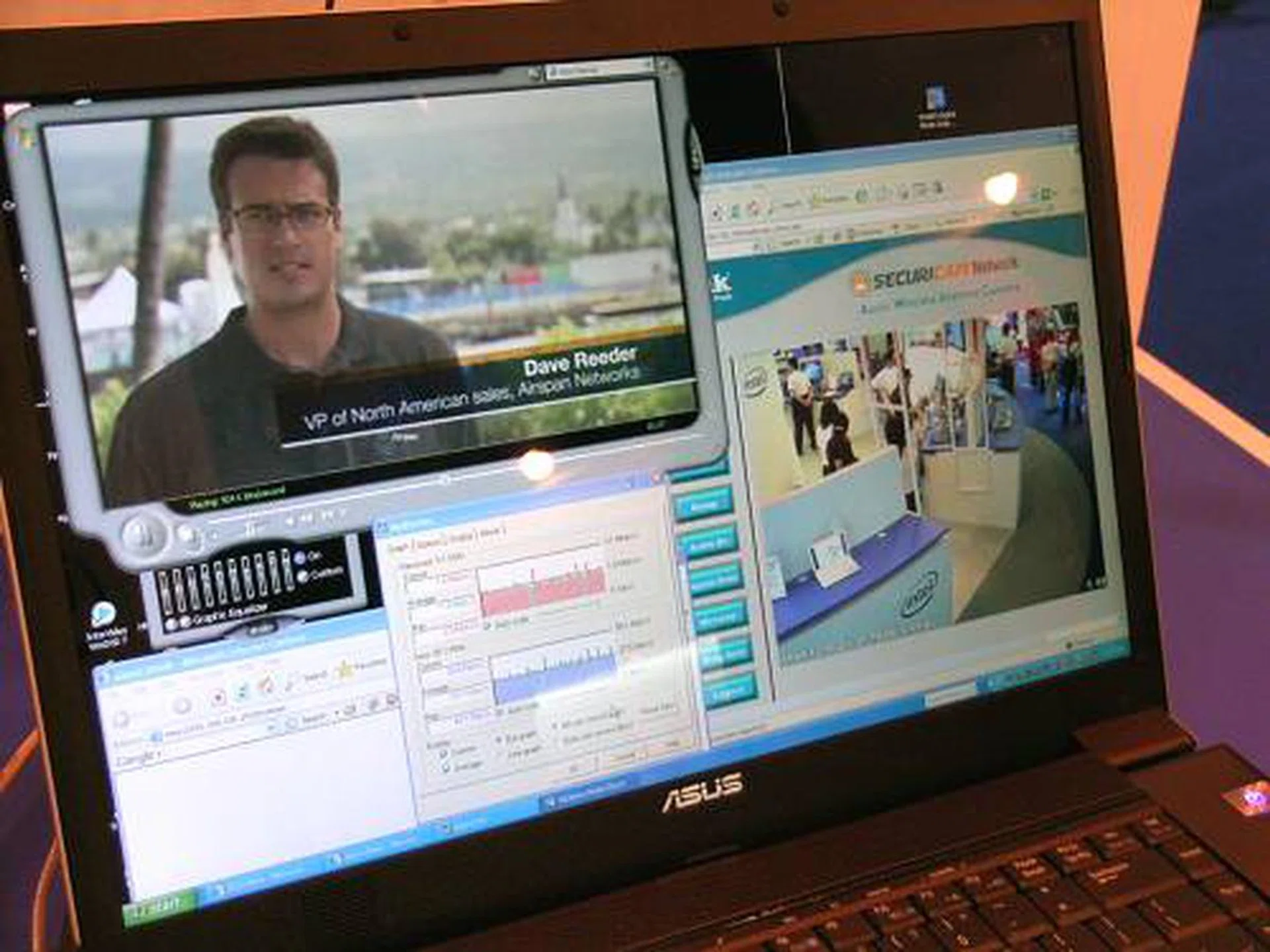 WiMAX demos up and running with a free romp of World of Warcraft and this localized high bandwidth streaming video playback, plus wireless live camera feed with more than enough bandwidth to spare.