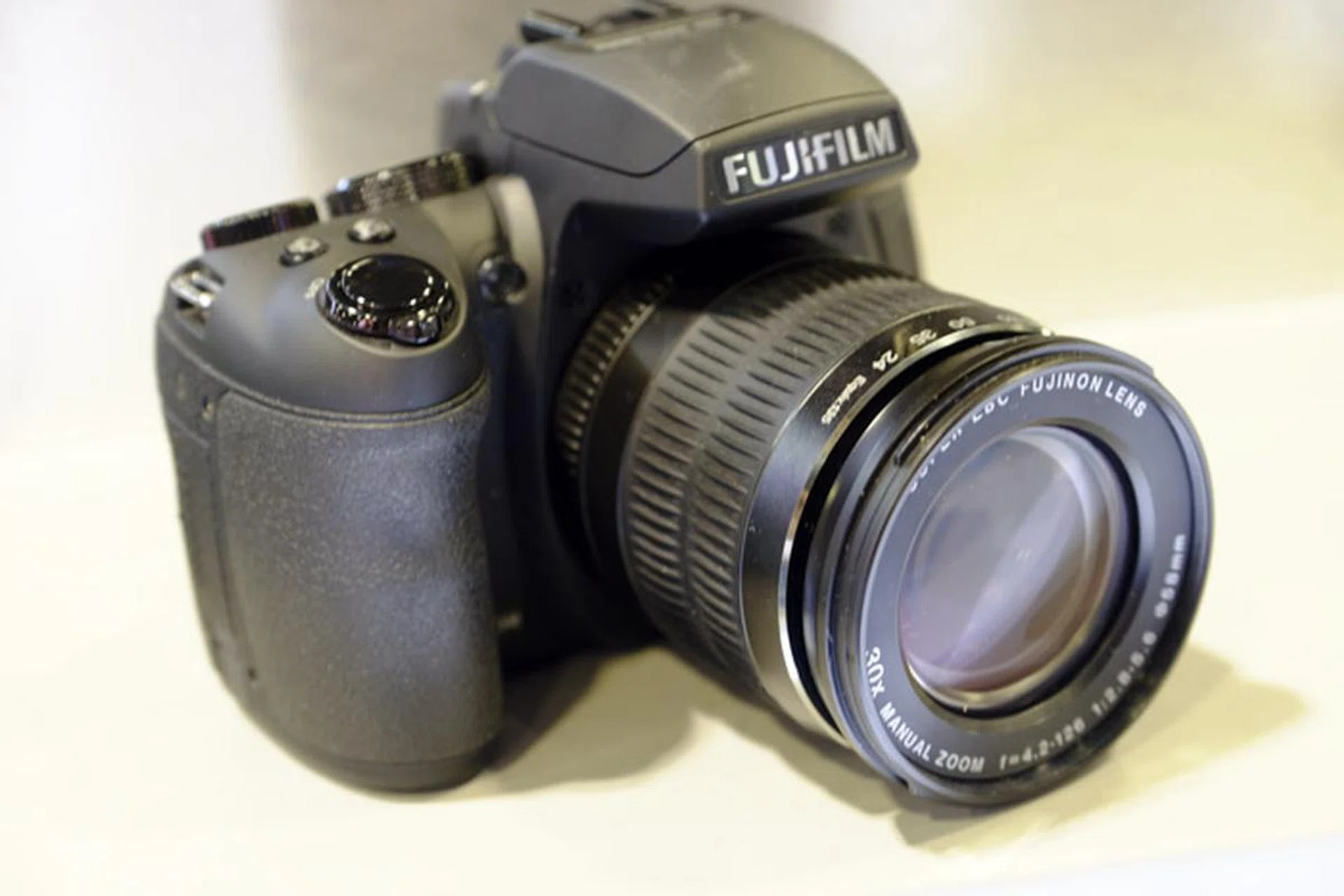 The Finepix HS35 boasts a 16MP 1/2-inch-type EXR CMOS II sensor with a 30X optical zoom lens. This is going for $349 at the show, and comes with a free case, 16GB SD card, cleaning kit, and tripod.