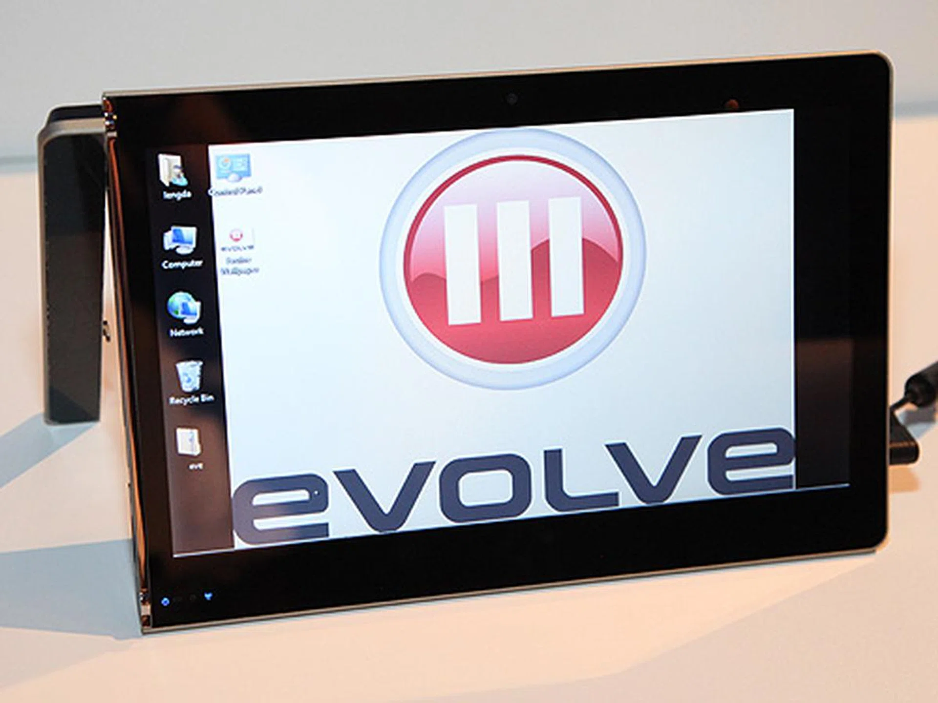 Evolve III's convertible tablet with an innovative built-in stand. It's based on the Oak Trail (Z670 processor) platform and it runs Windows.