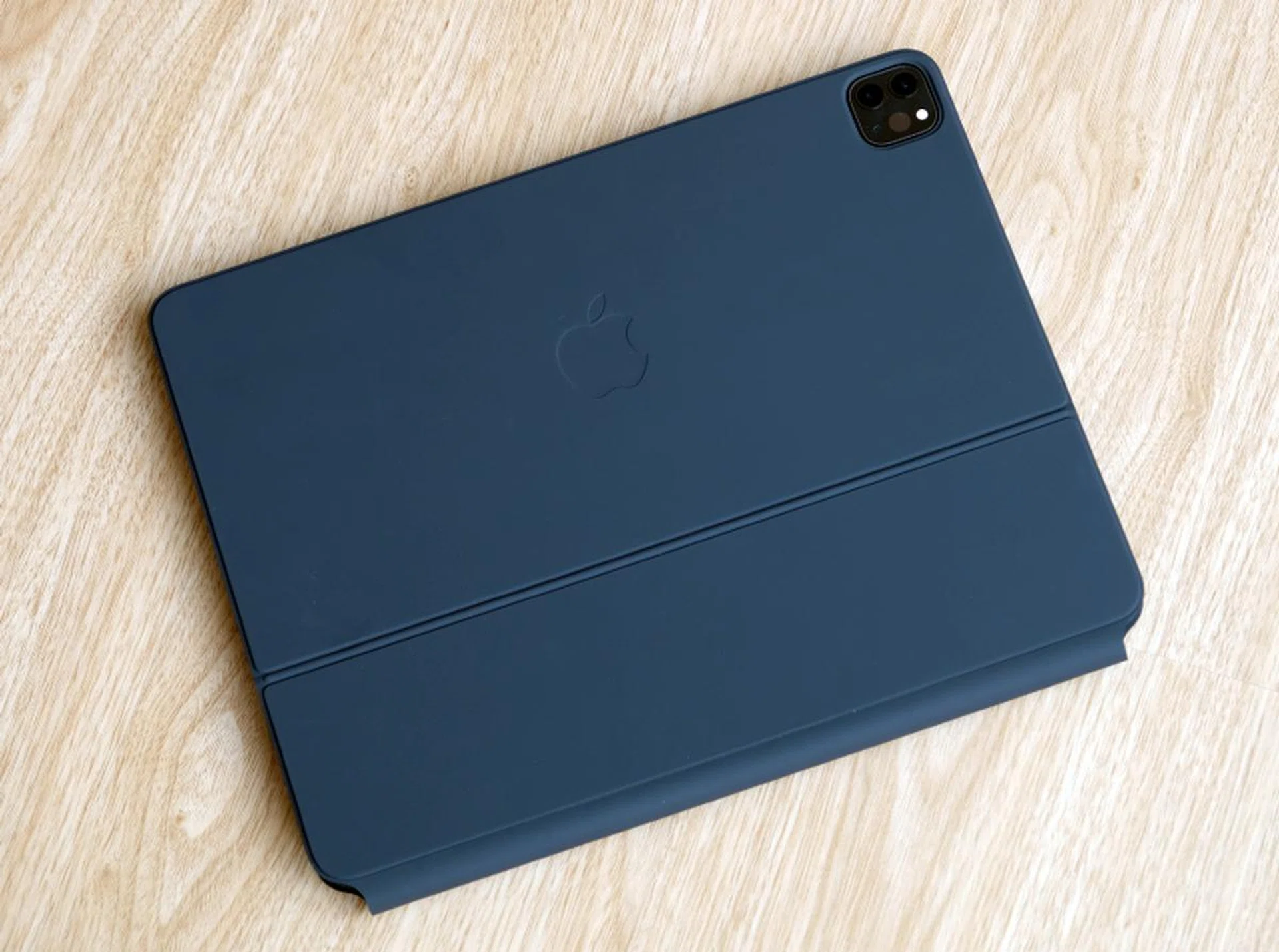 Much of the Magic Keyboard is covered in grey soft-touch rubber.