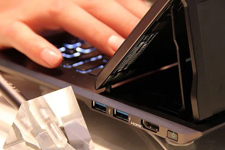 The power button, two USB ports, and the HDMI port are on the right hand side.