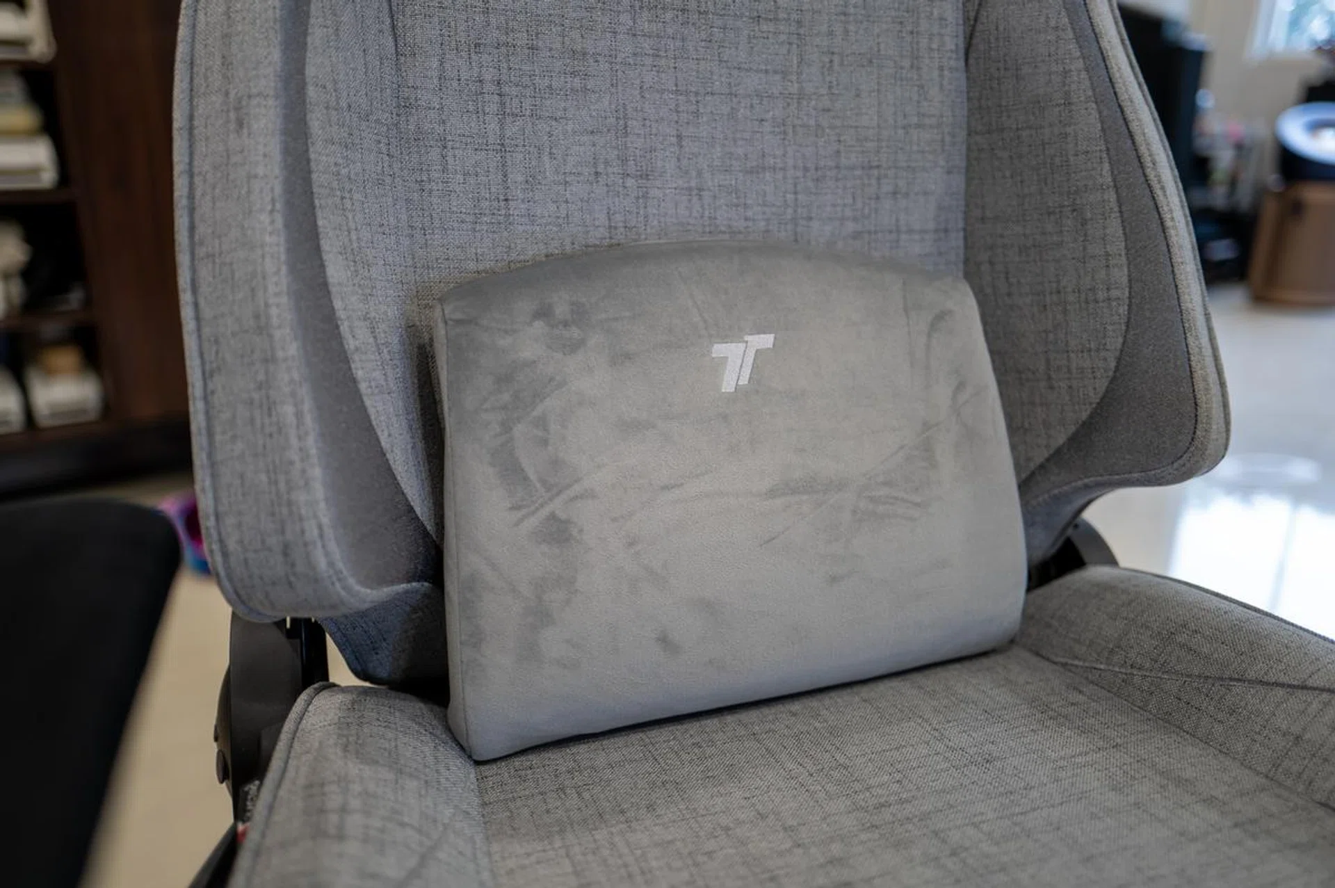 The memory foam lumbar pillow offers very limited back support.