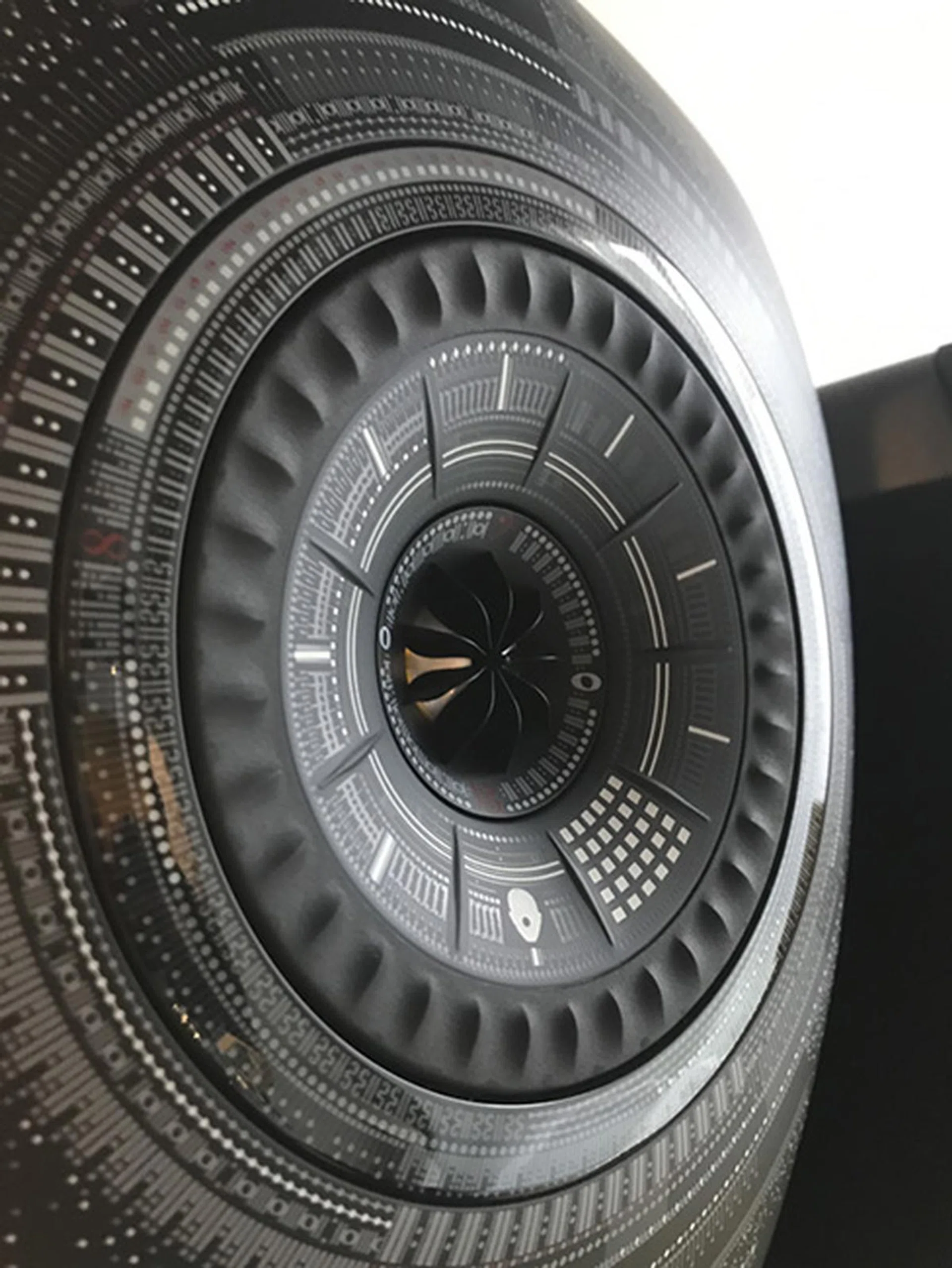 The patterns on the speaker actually represent sounds in the real world.