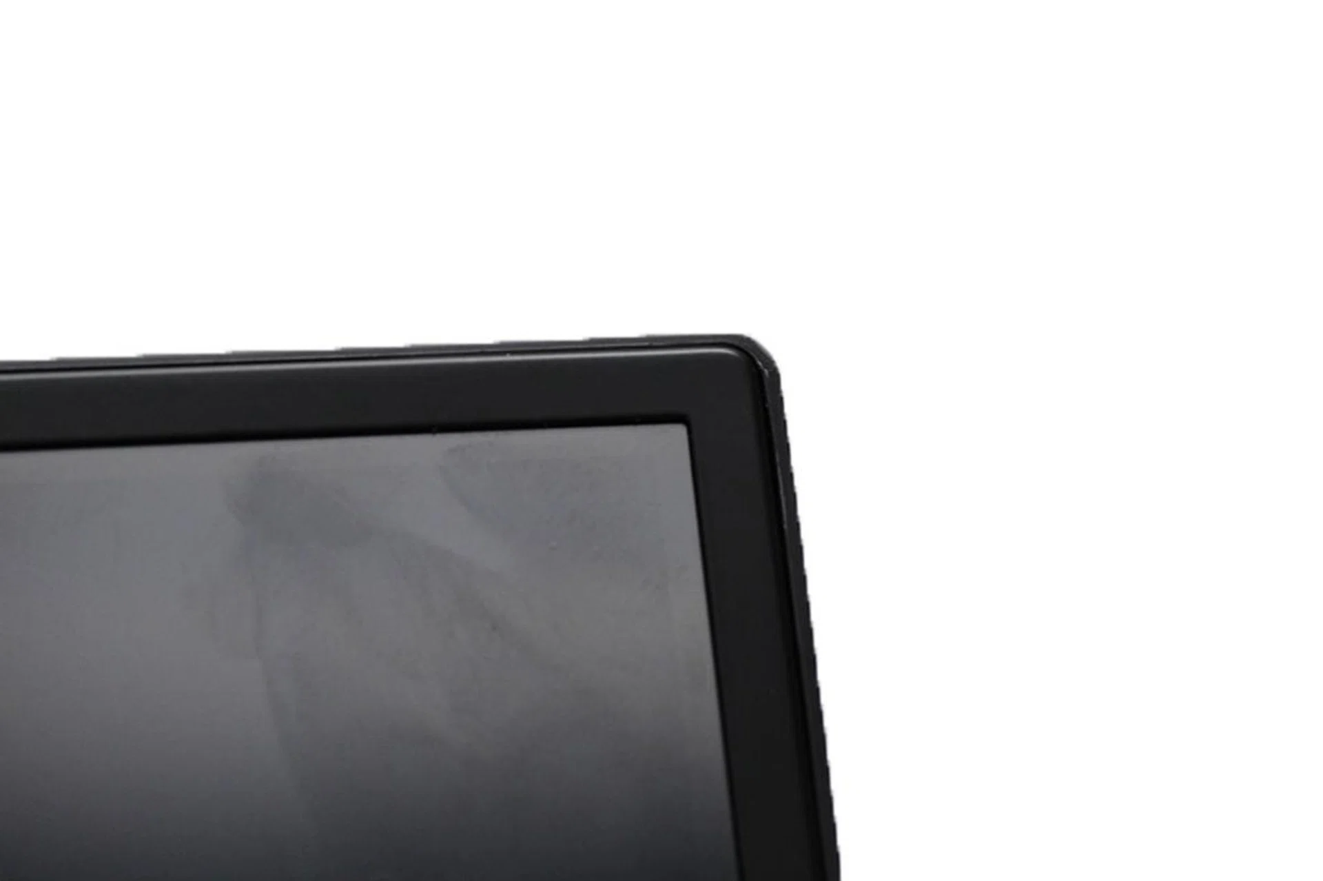 While the bezel might look sizable in the picture, this is an extreme close-up. In reality, it's barely noticeable when you enjoy its 27 inches of goodness.