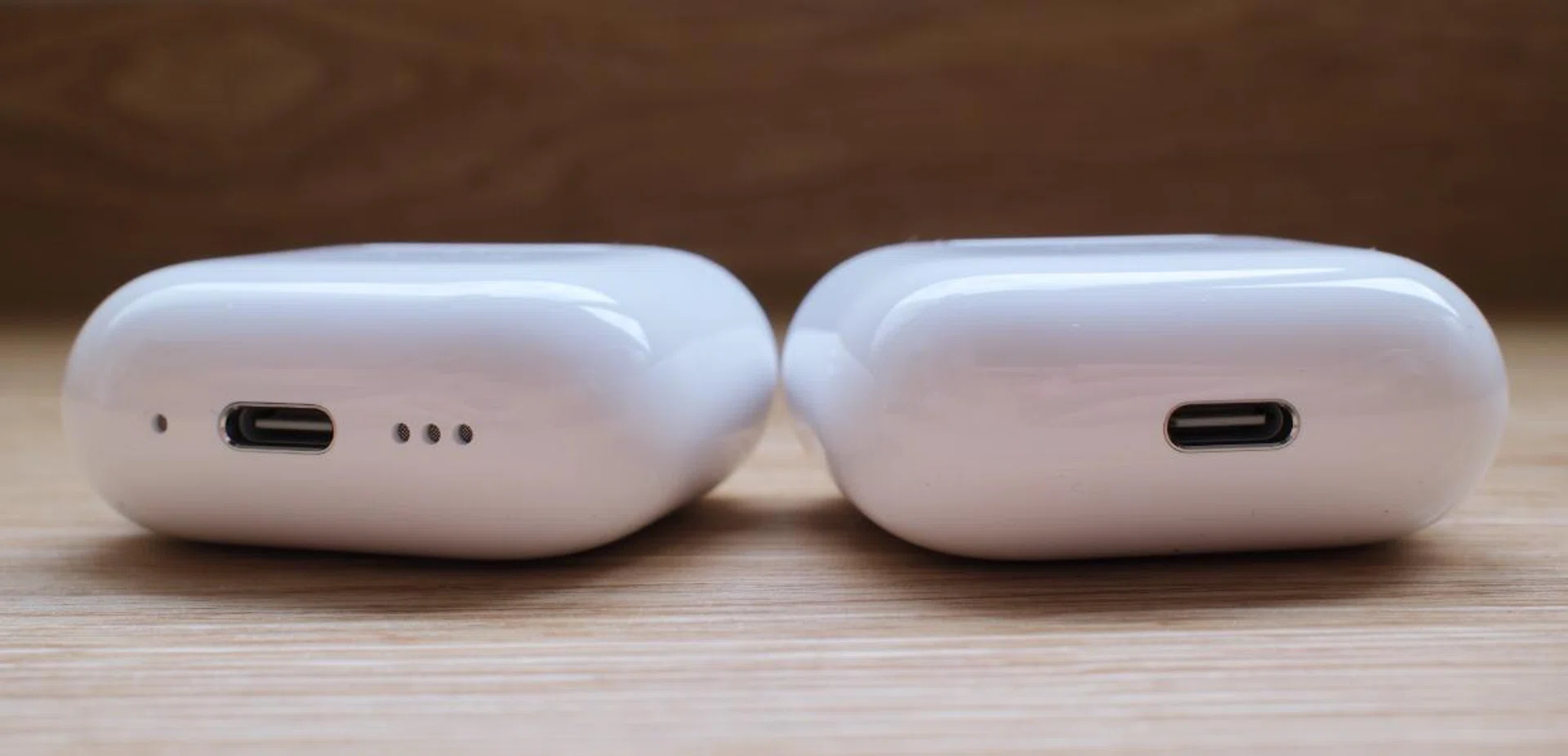 The only way to tell them is apart is by their charging case. The AirPods 4 with ANC's charging case has speakers for the Find My feature. Photo: HWZ