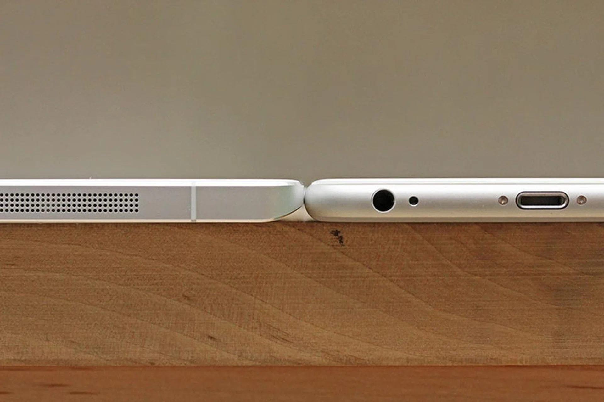 Viewed from the side, it's even more apparent that the difference in thickness is negligible.
