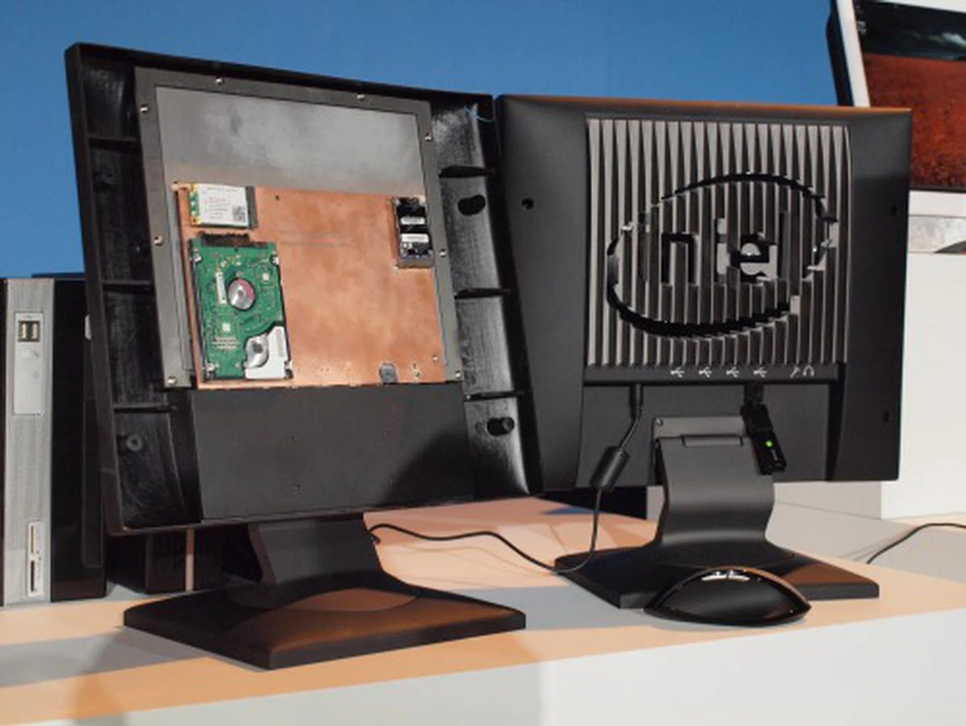  Integrate the system PCB with embedded CPU and memory, add on a hard drive and few I/O ports for interaction and presto! The monitor is a full fledged system - sort of.  