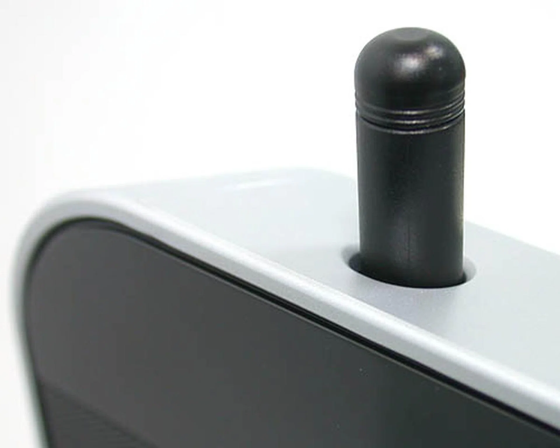 No worries if your fingers seem too pudgy or oily for the display, a stylus is included, hidden at the top corner of the screen. In fact you can use practically any pointed object (that won't scratch the screen) for this purpose.