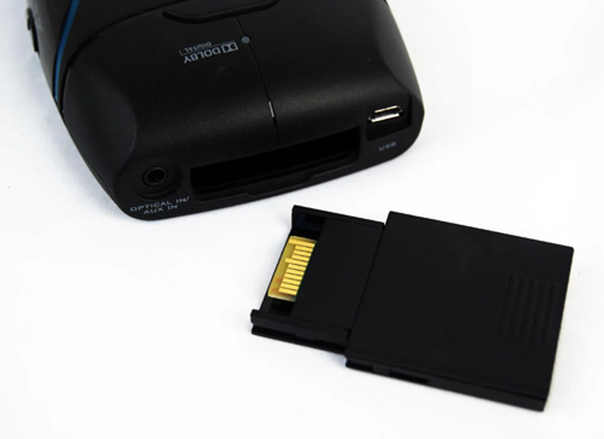 The top sports an optical port as well as the slot for the Tactic Link wireless card which provides uncompressed 2.4GHz wireless connectivity with the headset.