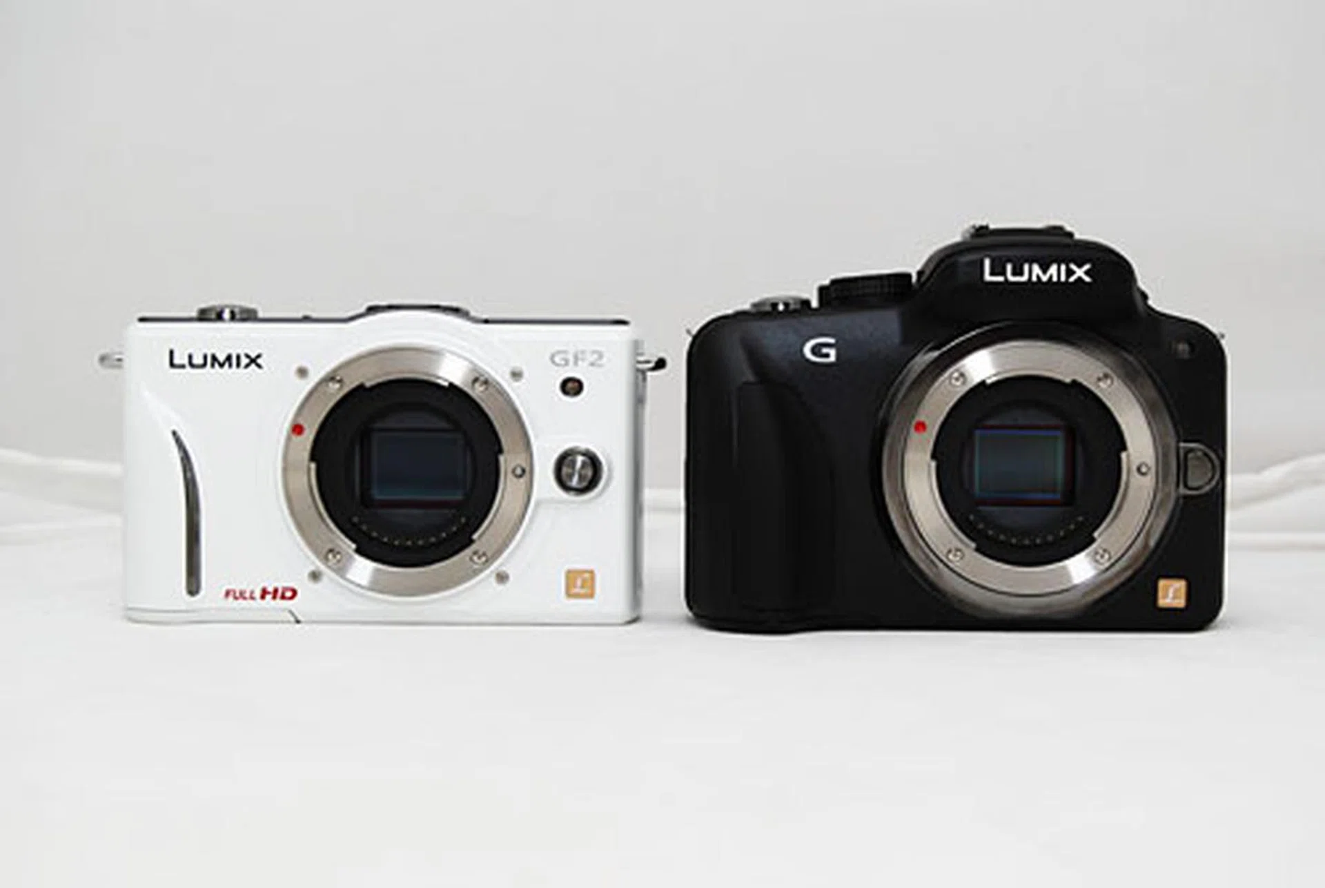 The Panasonic G3 (right) side by side with a Panasonic GF2 (left).