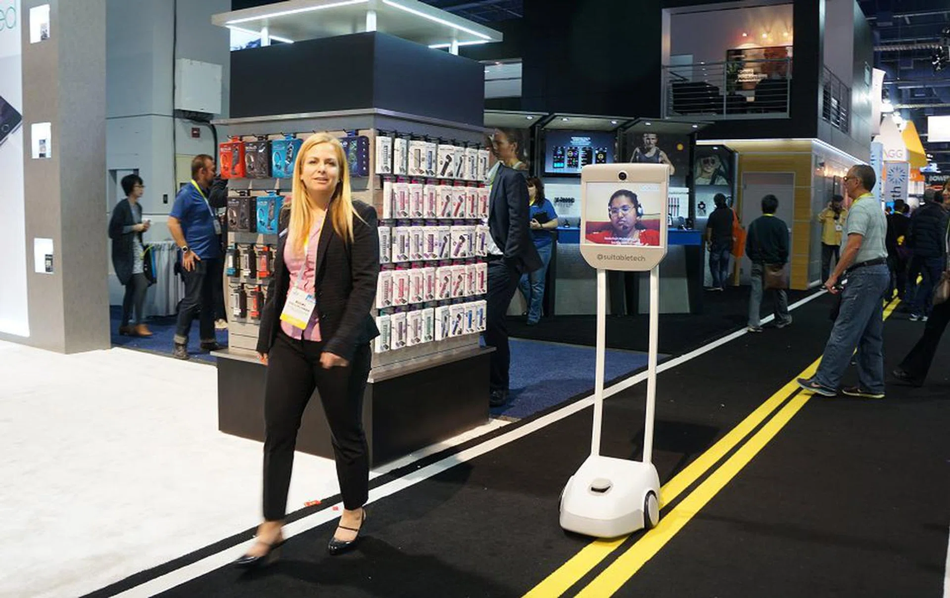 How would you like to video conference live with someone across the globe as they keep up with you through a Segway-like device, except there’s a big video monitor and a camera so that the person on the other side can see what’s happening and you can have a lively conversation? This is the BeamPro and it’s making its presence felt in a big way at the show.