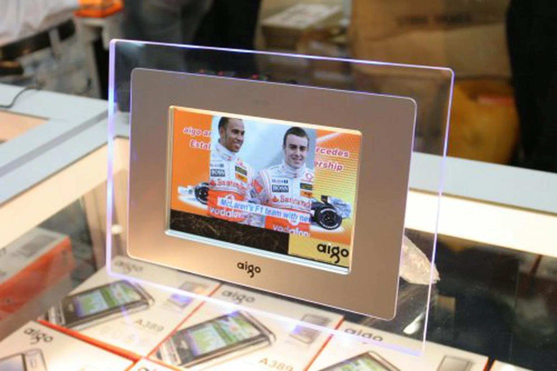  The aigo A396+ digital photo frame offers video playback support in addition to displaying your photos with slide-show functionality, customizable background music, remote control function and supports multiple input formats such as SD/MMC/CF/XD/MS Pro and generic USB. The A396+ is a hot buy at Comex and the first 50 customers get a free 1GB dual interface SD/USB memory card.  