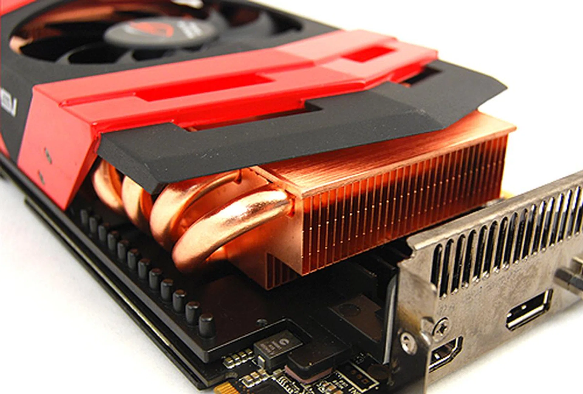 Removing the huge cooler, you'll see that it heatsink base is thick, huge and heavy with multiple thermal pads cooling various components on board. Thankfully the cooler is so silent, you can't tell if it's functioning!