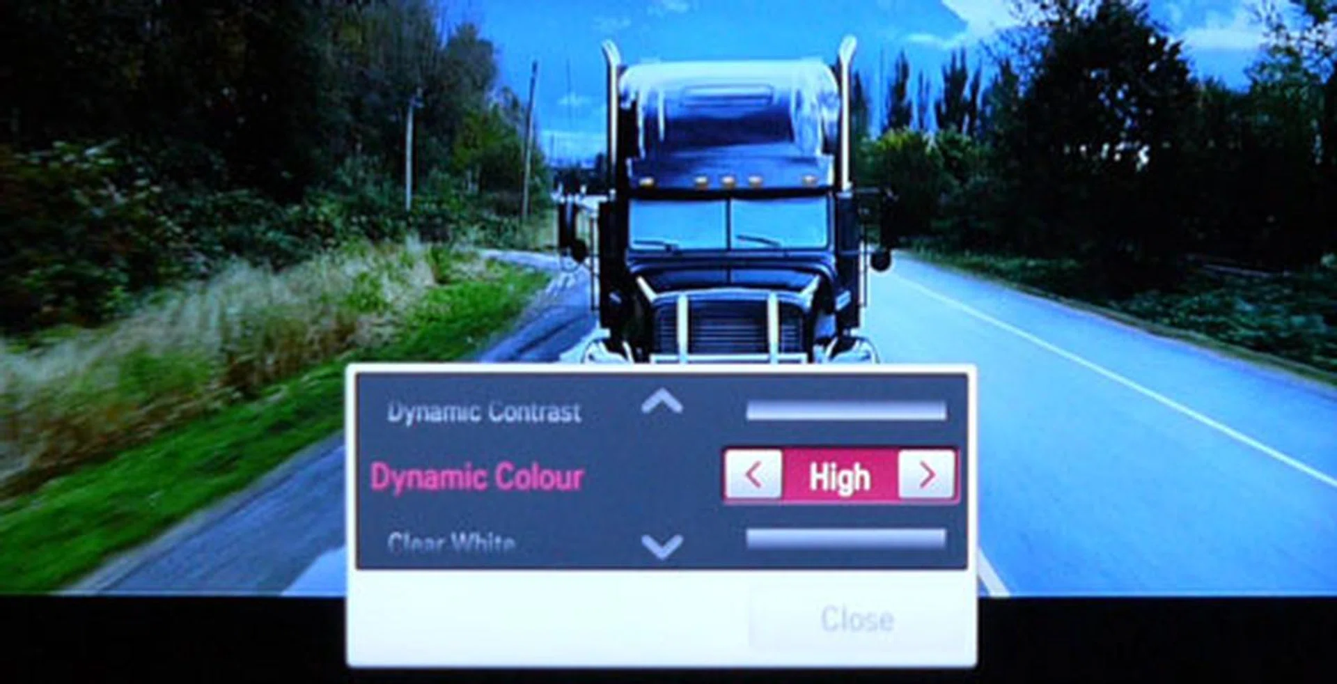 Avoid the TV's Dynamic Color setting at all costs! In this instance, the road took on a blueish hue instead of its natural pale grey tone with Dynamic Color set to High. This feature is effective in boosting colors but it also offsets color balances as well. 