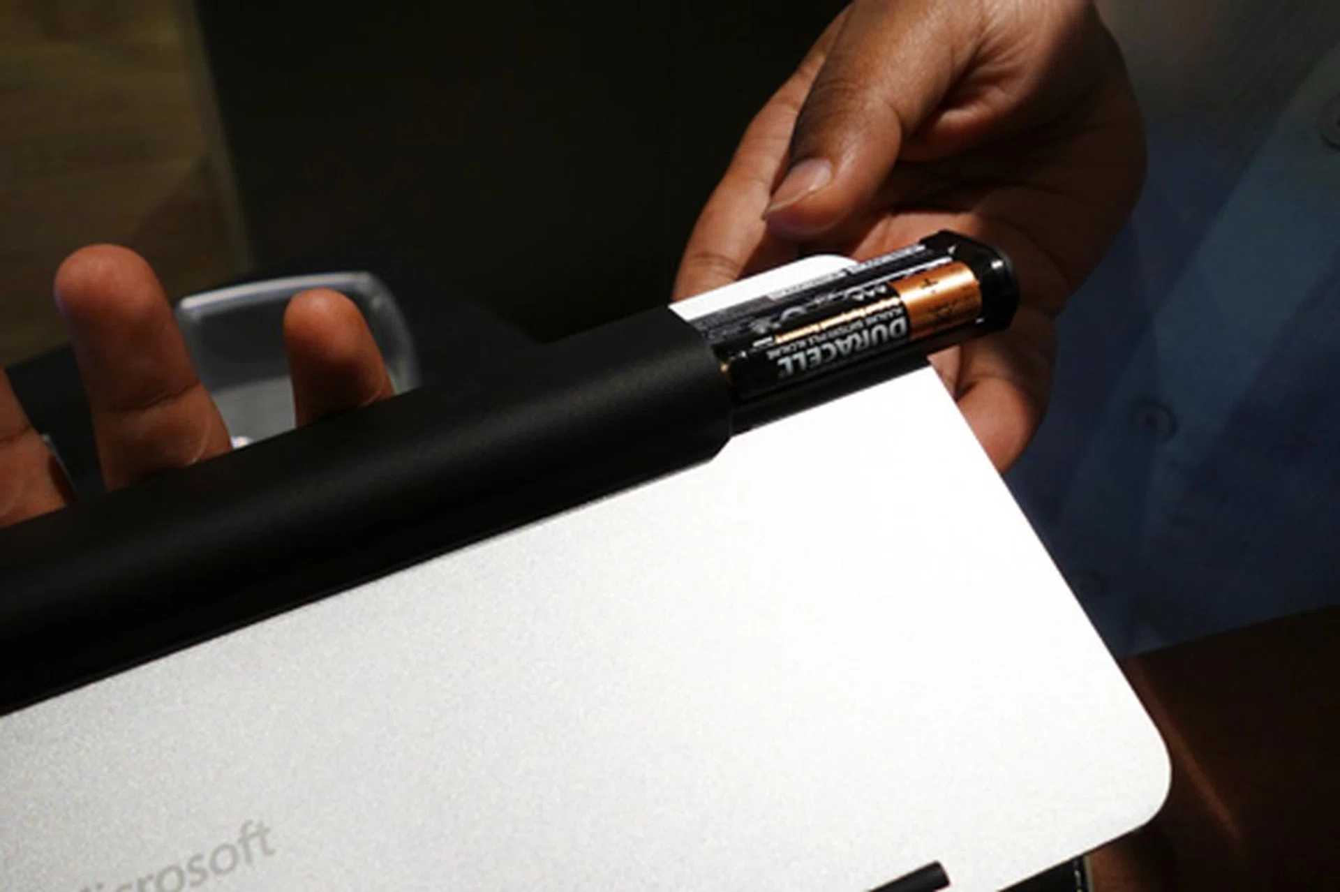 The keyboard requires two AAA batteries. The battery compartment on its base doubles up as a stand for the keyboard.