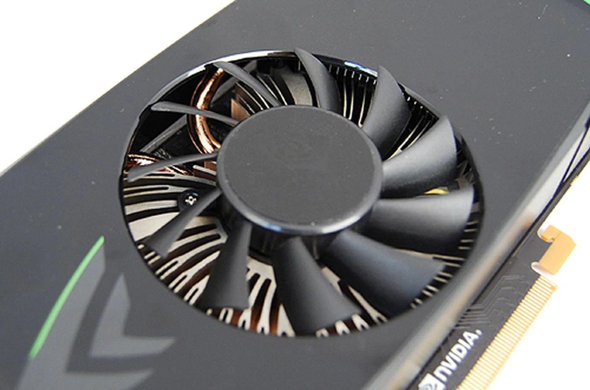The GeForce GTX 460 uses a radial heatsink design, and peering closely, we can see the use of copper heat pipes to quickly draw and dissipate heat away from the GPU core. On casual glances, the aluminum heatsink design resembles that of an old Intel stock cooler, but that's just a side note for techies.