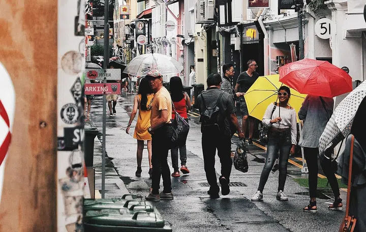 Possibly Singaporeans in Haji Lane, not using chatbots in the photo. Photo by Carson Arias on Unsplash.