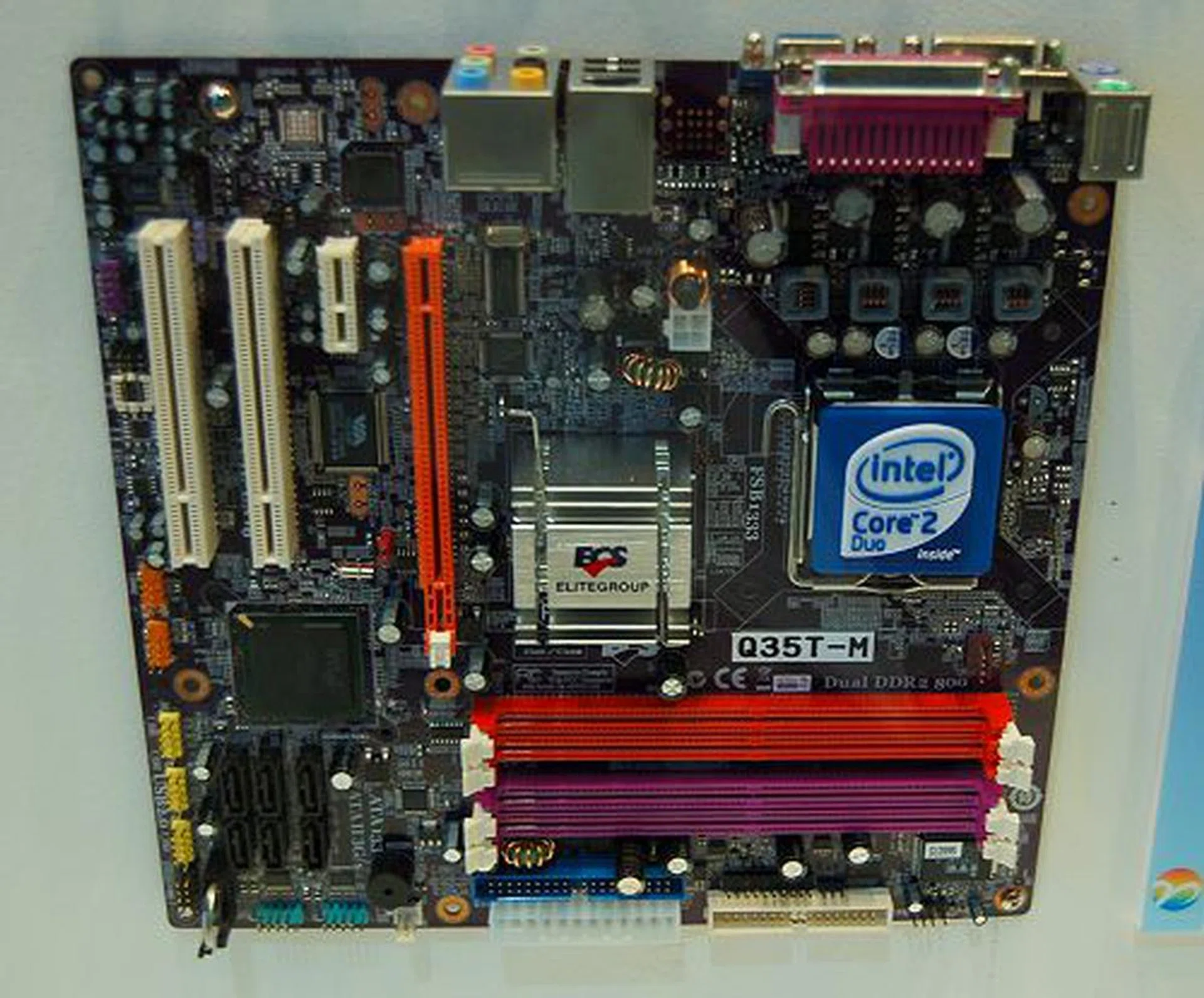 Using a similar layout as the above board, here's a business class Q35T-M motherboard using the Q35 + ICH9DO chipset. Instead of Viiv, this board supports Intel vPro technology. DVI-D output and FireWire features are still retained though.  